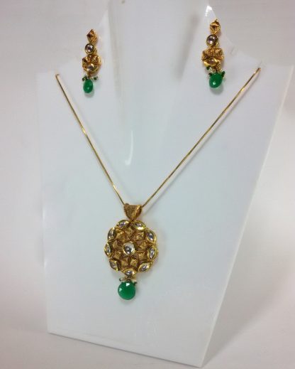 Emerald shade Kundan Pendant and Earrings