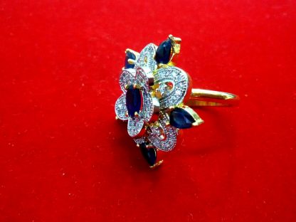 Daphne Gold Plated Unique Ring With American Diamond And Blue Color Stone Side Looks