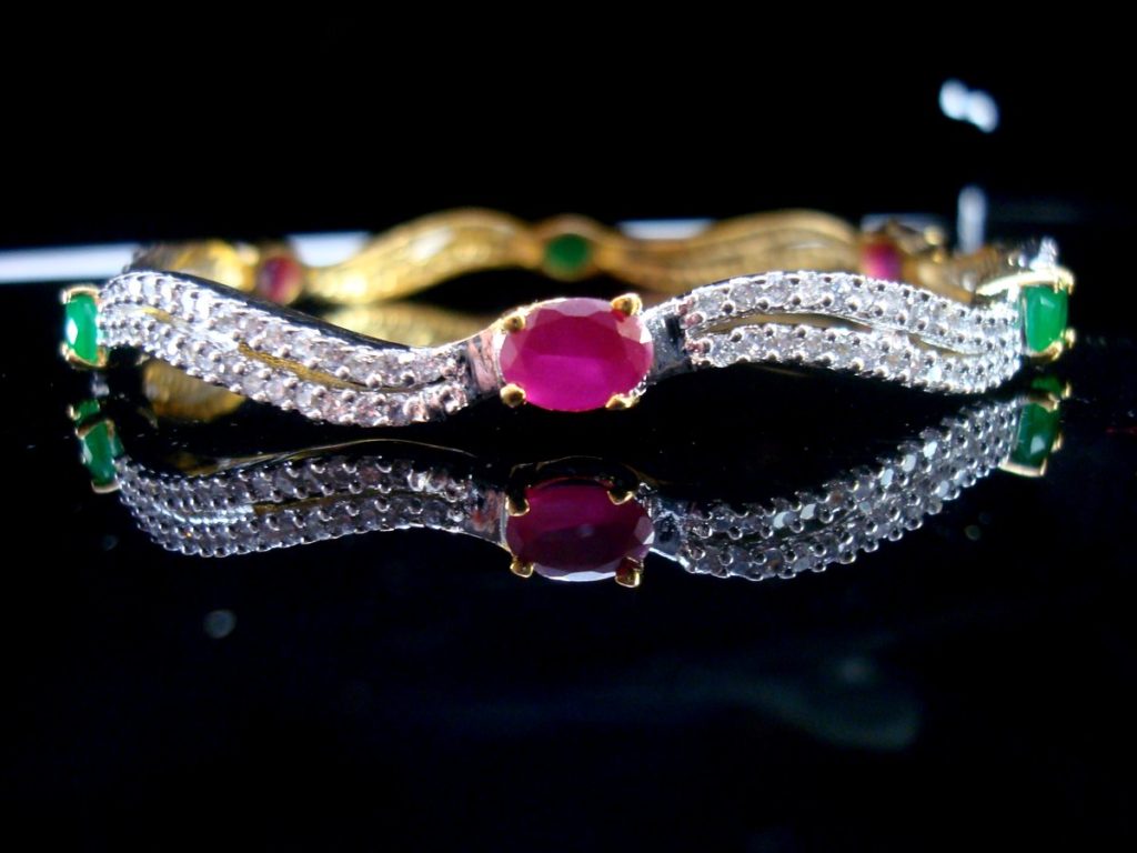 Daphne Curvy Zircon Studded Pink and Green Stone Bangle for women - Closeup