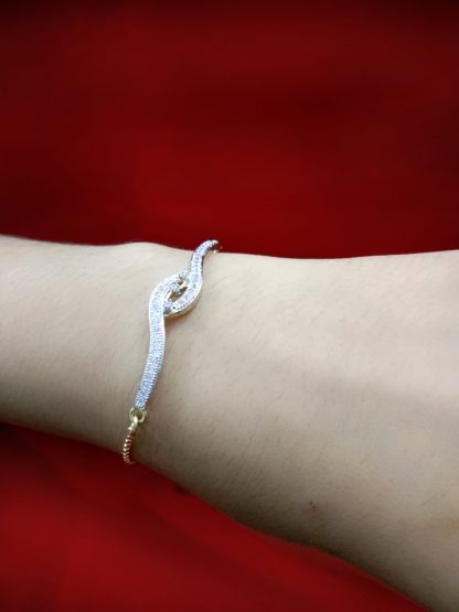 BR66 Daphne Sleek Zircon Gold Silver Plated Rakhi Bracelet For Raksha Bandhan Arm View