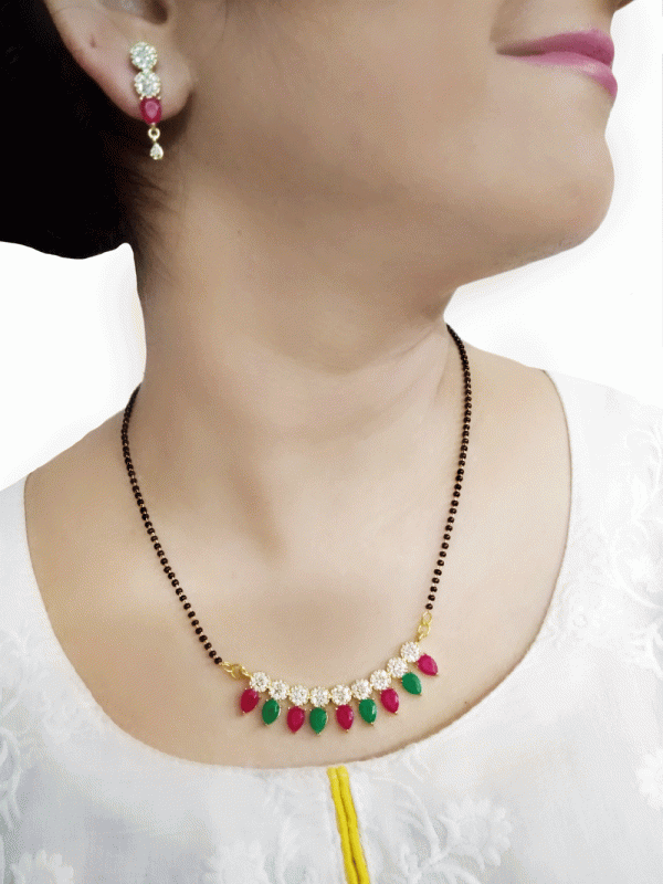 HC74 Daphne Stylish Ruby and Emerald Shades Leaf Shaped Earring For Karva Chauth Special